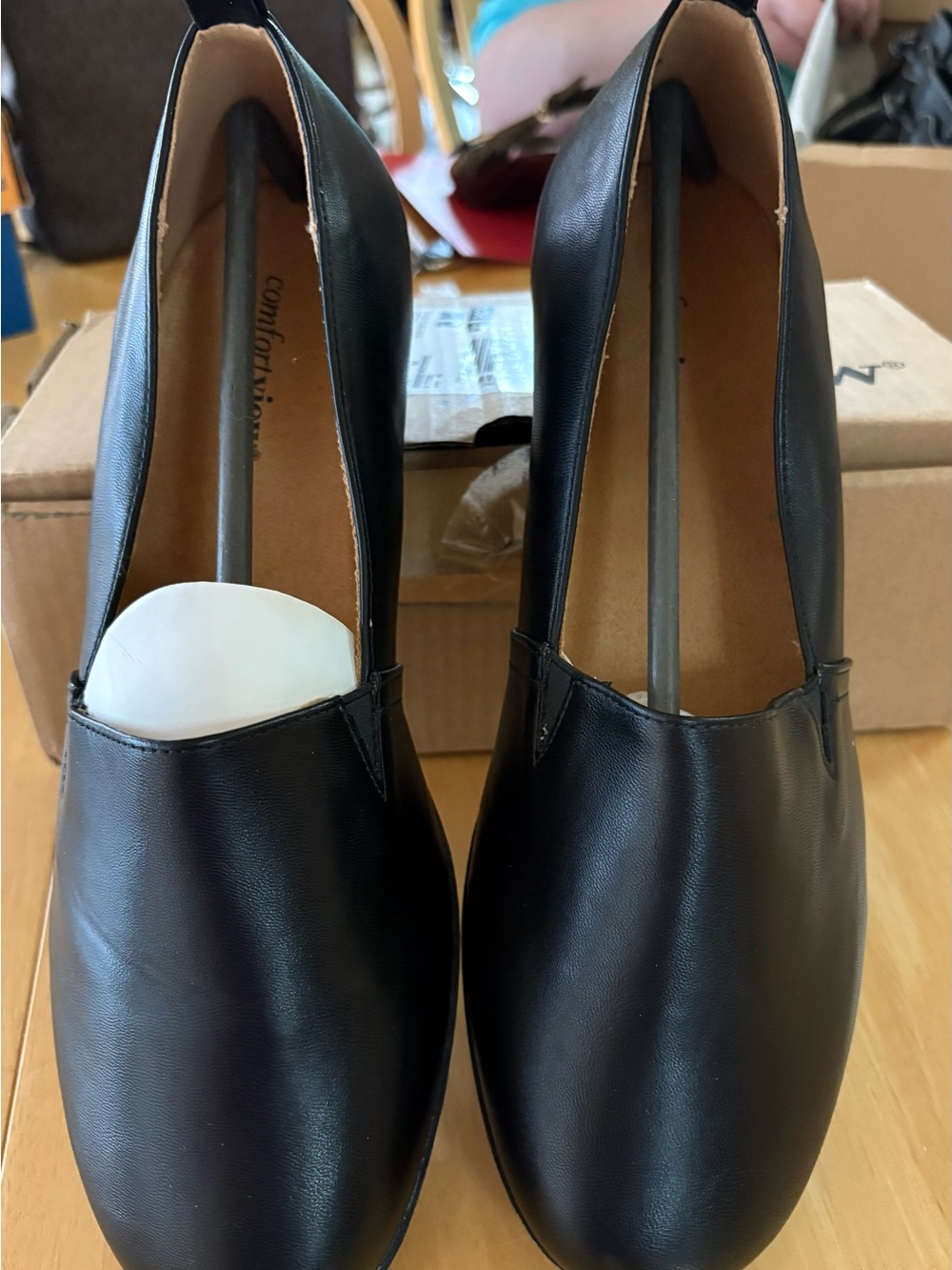 Comfortiva Black Leather Slip-On Flats with Minimalist Silhouette